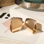 Brinco Banhado à Ouro 18K Curvado Orgânico