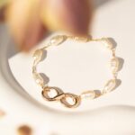 Pulseira Banhado à Ouro 18K Pérola Coreana Fecho Infinito